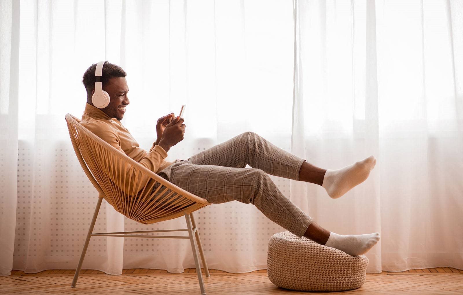 Man in chair listening to music